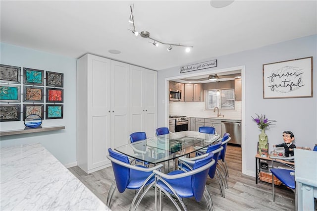 1929 E 36th St, Brooklyn, NY 11234 - dining room featuring light wood-style flooring and baseboards