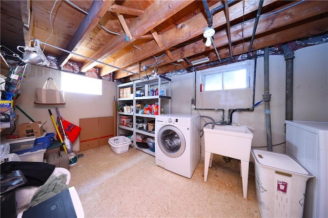 223 Abingdon Ave, Staten Island, NY 10308 - basement featuring tile patterned floors, a sink, and separate washer and dryer
