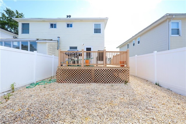 223 Abingdon Ave, Staten Island, NY 10308 - back of house with a fenced backyard and a deck