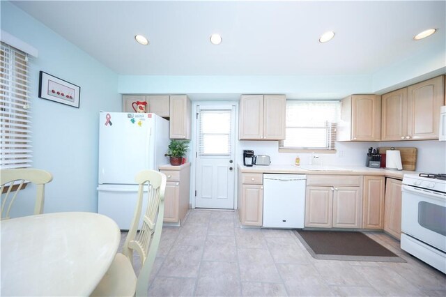 223 Abingdon Ave, Staten Island, NY 10308 - kitchen featuring white appliances, a sink, light countertops, light brown cabinetry, and recessed lighting