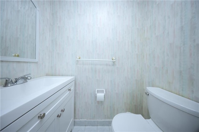 223 Abingdon Ave, Staten Island, NY 10308 - bathroom with toilet, vanity, and tile patterned flooring