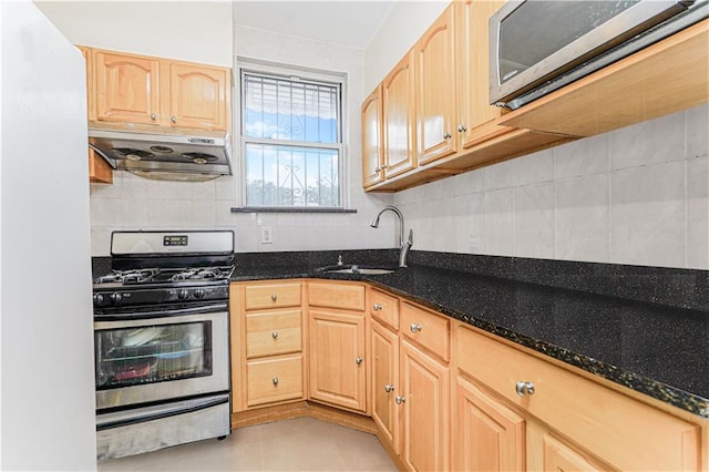 1922 E 16th St, Brooklyn, NY 11229 - kitchen featuring appliances with stainless steel finishes, ventilation hood, light brown cabinetry, and tasteful backsplash