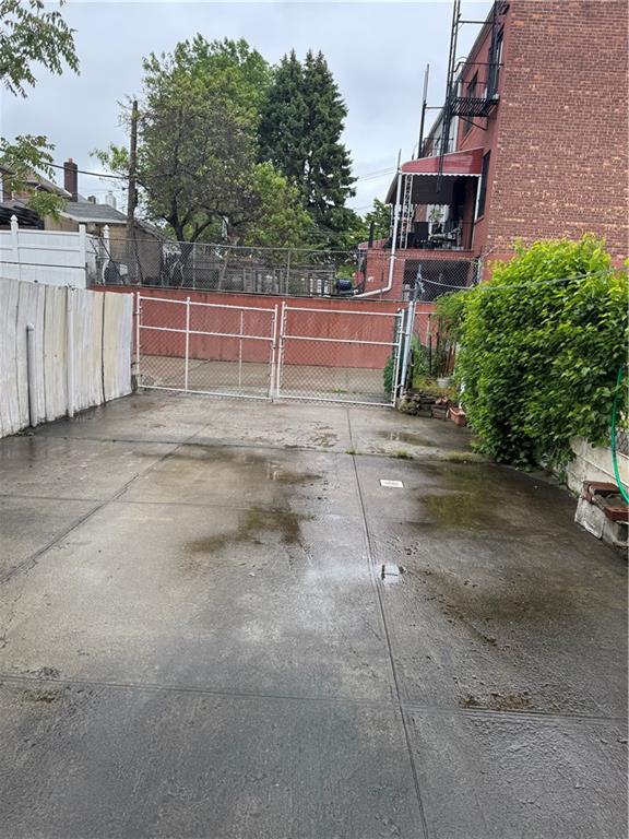 4515 Foster Ave, Brooklyn, NY 11203 - view of patio / terrace featuring a gate