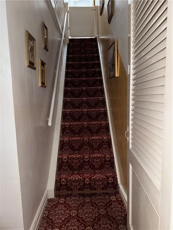 4515 Foster Ave, Brooklyn, NY 11203 - staircase with baseboards and tile patterned floors
