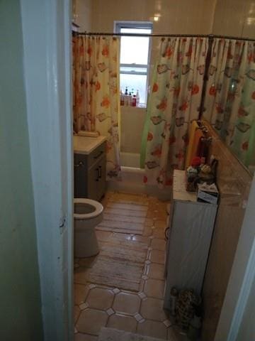 1358 E 35th St, Brooklyn, NY 11210 - full bathroom with toilet, shower / tub combo with curtain, tile patterned flooring, and vanity