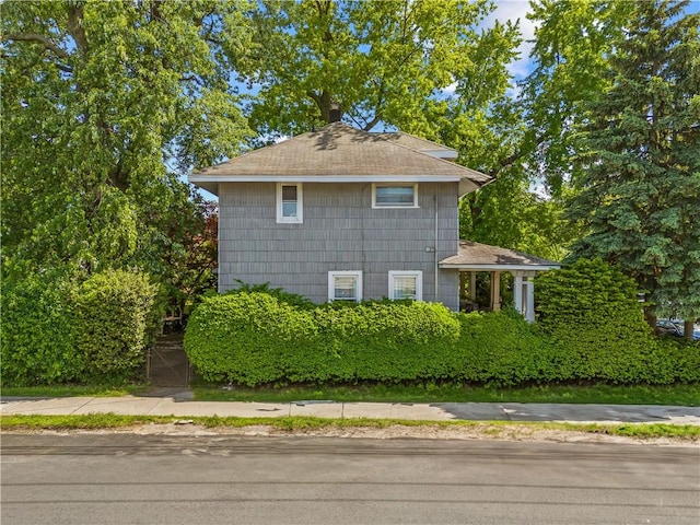 701 127th St, Queens, NY 11356 - view of home's exterior with a shingled roof