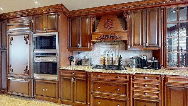 1311 Brightwater Ave Unit 8De, Brooklyn, NY 11235 - kitchen featuring stainless steel appliances, custom range hood, decorative backsplash, light stone countertops, and recessed lighting