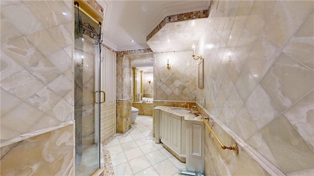 1311 Brightwater Ave Unit 8De, Brooklyn, NY 11235 - bathroom with ornamental molding, tile walls, toilet, vanity, and a shower stall