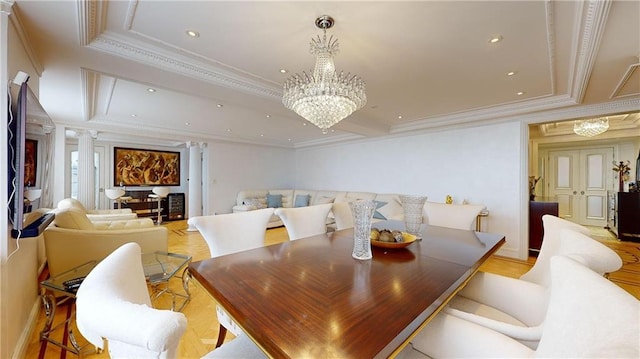 1311 Brightwater Ave Unit 8De, Brooklyn, NY 11235 - dining space with a chandelier, crown molding, ornate columns, a raised ceiling, and recessed lighting