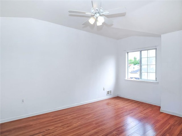 50 Chesebrough St, Staten Island, NY 10312 - empty room featuring vaulted ceiling, wood finished floors, and ceiling fan