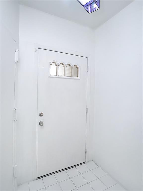50 Chesebrough St, Staten Island, NY 10312 - foyer with light tile patterned floors