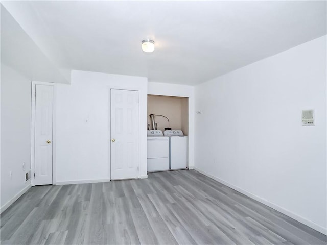50 Chesebrough St, Staten Island, NY 10312 - additional living space with light wood-style floors and washing machine and dryer