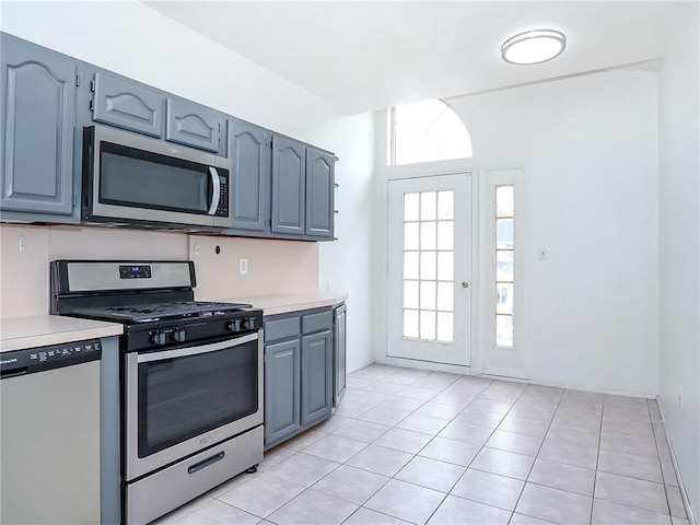 50 Chesebrough St, Staten Island, NY 10312 - kitchen featuring stainless steel appliances, light countertops, and light tile patterned floors