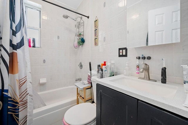 1436 78th St, Brooklyn, NY 11228 - bathroom with tile walls, shower / bath combo with shower curtain, vanity, toilet, and tasteful backsplash