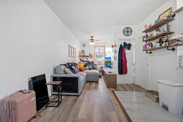 1436 78th St, Brooklyn, NY 11228 - living room with a ceiling fan and light wood-style floors