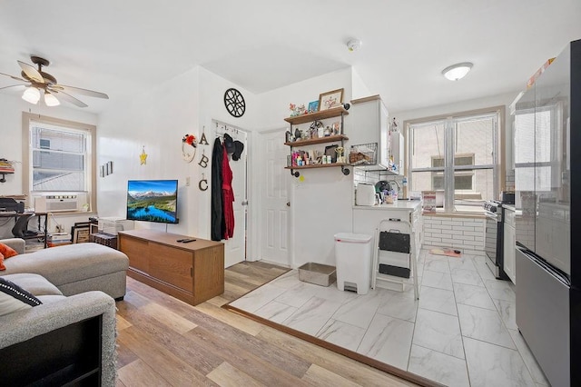 1436 78th St, Brooklyn, NY 11228 - living area with a ceiling fan, cooling unit, and light marble finish floors