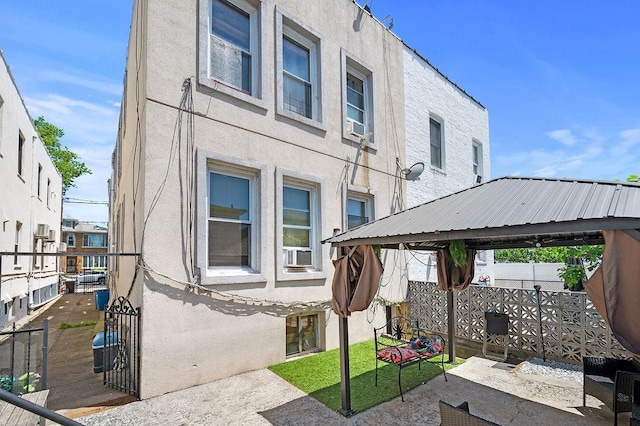 1436 78th St, Brooklyn, NY 11228 - view of patio with a gazebo and cooling unit