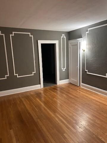 79 Mundy Ave, Staten Island, NY 10310 - unfurnished room with wood finished floors and baseboards