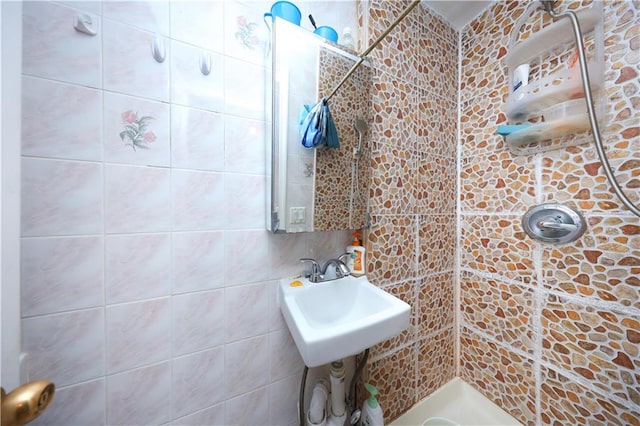 2144 W 6th St, Brooklyn, NY 11223 - full bathroom with tiled shower, a sink, and tile walls