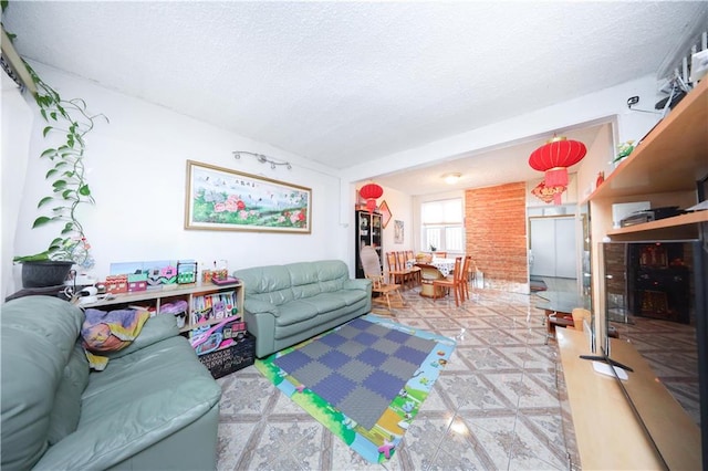 2144 W 6th St, Brooklyn, NY 11223 - living room featuring a textured ceiling