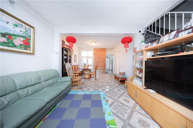 2144 W 6th St, Brooklyn, NY 11223 - living room featuring a textured ceiling