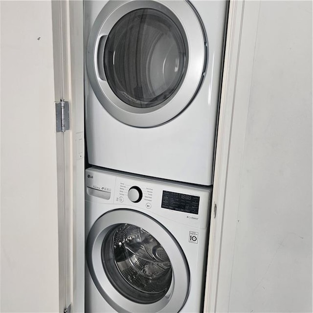 2823 Batchelder St, Brooklyn, NY 11235 - washroom featuring estacked washer and dryer