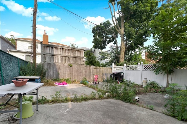 2823 Batchelder St, Brooklyn, NY 11235 - fenced backyard featuring a patio