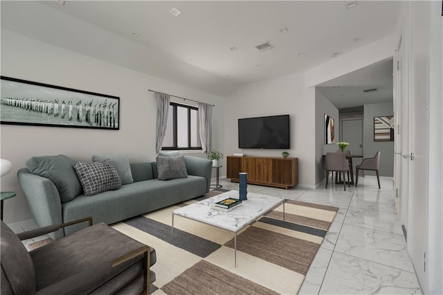 2823 Batchelder St, Brooklyn, NY 11235 - living room featuring light marble finish floors, baseboards, and vaulted ceiling