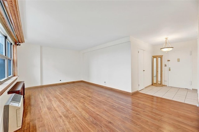 2483 W 16th St Unit 10K, Brooklyn, NY 11214 - spare room featuring light wood-type flooring