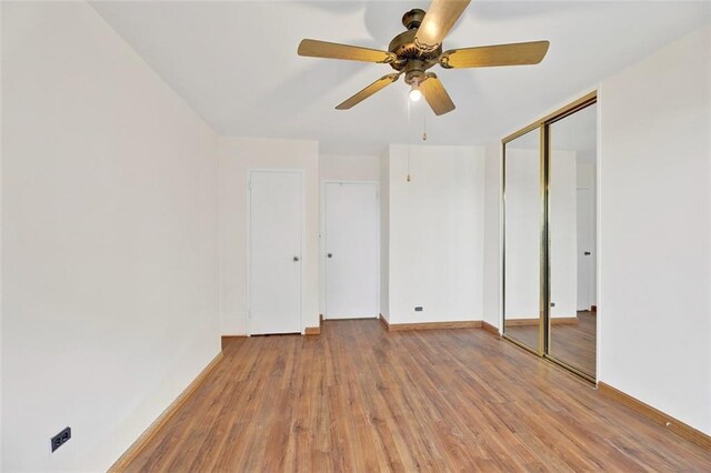 2483 W 16th St Unit 10K, Brooklyn, NY 11214 - unfurnished bedroom with light wood-style flooring and a ceiling fan