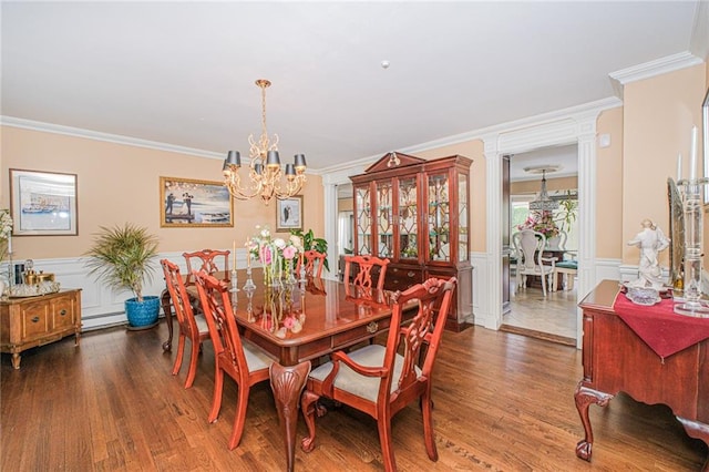 34 Burton Ave, Staten Island, NY 10309 - dining space featuring crown molding, a chandelier, wood finished floors, a wainscoted wall, and a decorative wall