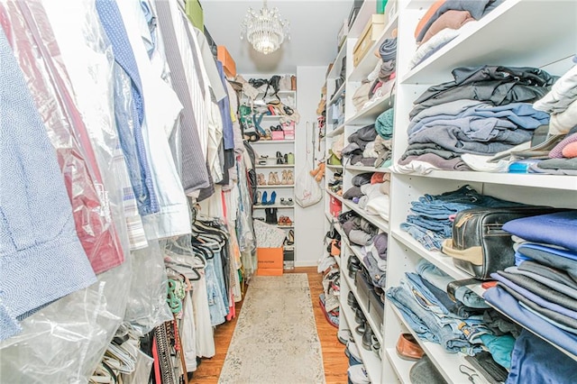 34 Burton Ave, Staten Island, NY 10309 - spacious closet with a chandelier and light wood-style flooring