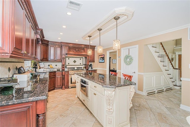 34 Burton Ave, Staten Island, NY 10309 - kitchen featuring stainless steel appliances, decorative backsplash, dark stone counters, recessed lighting, and hanging light fixtures