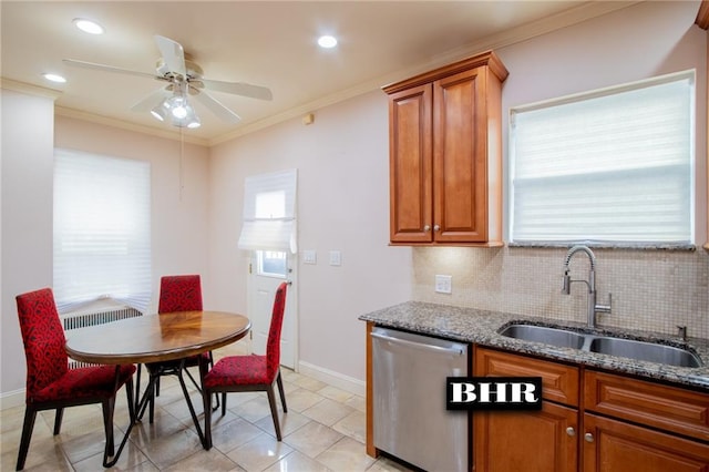 4060 Ocean Ave, Brooklyn, NY 11235 - kitchen with dishwasher, dark stone countertops, brown cabinetry, crown molding, and a ceiling fan