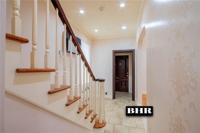 4060 Ocean Ave, Brooklyn, NY 11235 - staircase featuring crown molding, arched walkways, recessed lighting, and tile patterned flooring