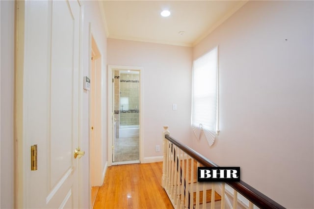 4060 Ocean Ave, Brooklyn, NY 11235 - corridor with an upstairs landing, crown molding, light wood-style floors, and recessed lighting
