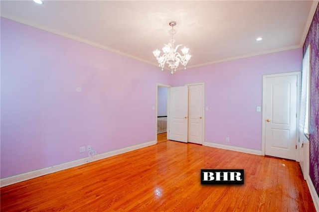 4060 Ocean Ave, Brooklyn, NY 11235 - unfurnished bedroom with a chandelier, light wood-style flooring, crown molding, and recessed lighting