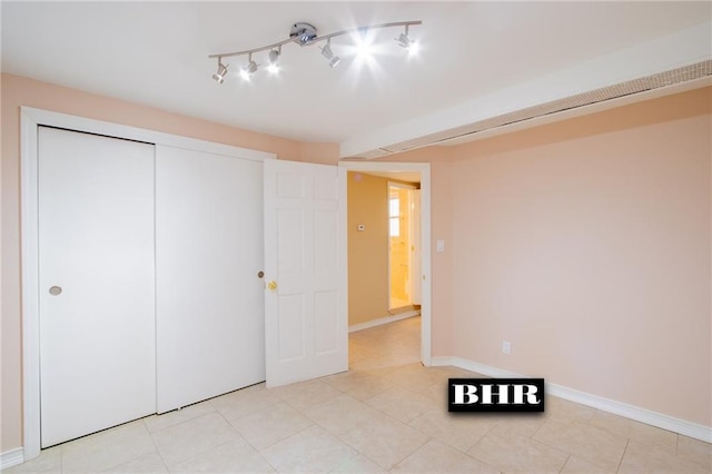 4060 Ocean Ave, Brooklyn, NY 11235 - unfurnished bedroom with a closet and light tile patterned floors