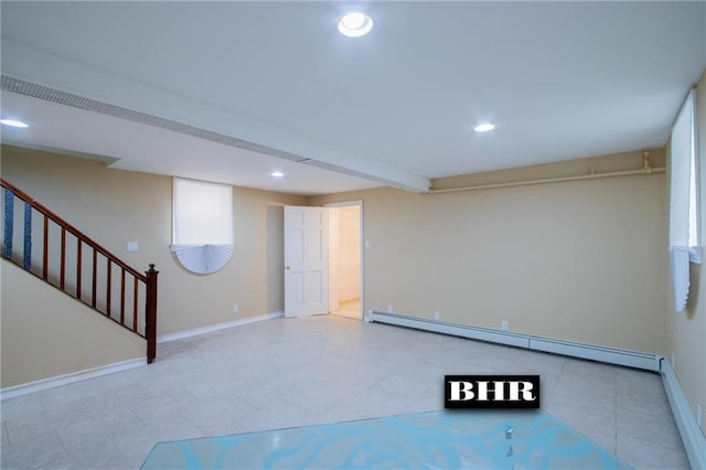 4060 Ocean Ave, Brooklyn, NY 11235 - finished below grade area featuring a baseboard heating unit, recessed lighting, and stairway