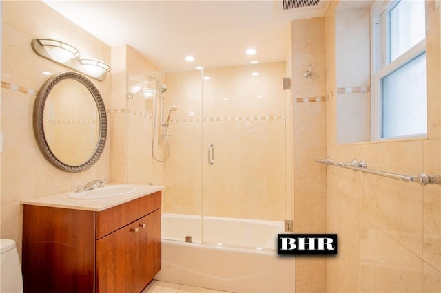 4060 Ocean Ave, Brooklyn, NY 11235 - full bath featuring vanity, enclosed tub / shower combo, tile walls, and recessed lighting