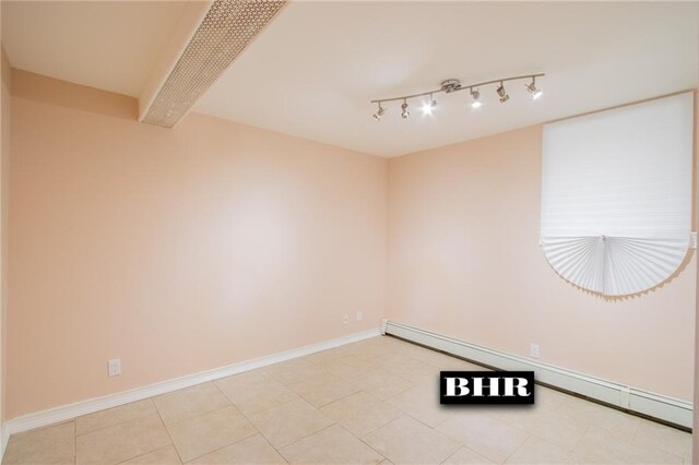 4060 Ocean Ave, Brooklyn, NY 11235 - spare room with a baseboard radiator and baseboards