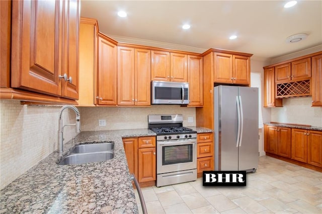 4060 Ocean Ave, Brooklyn, NY 11235 - kitchen with appliances with stainless steel finishes, light stone counters, decorative backsplash, crown molding, and recessed lighting