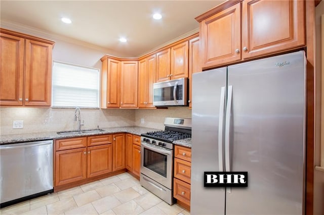 4060 Ocean Ave, Brooklyn, NY 11235 - kitchen featuring appliances with stainless steel finishes, light stone countertops, tasteful backsplash, crown molding, and light tile patterned floors