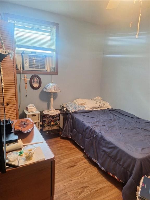1675 72nd St, Brooklyn, NY 11204 - bedroom featuring light wood-type flooring and cooling unit