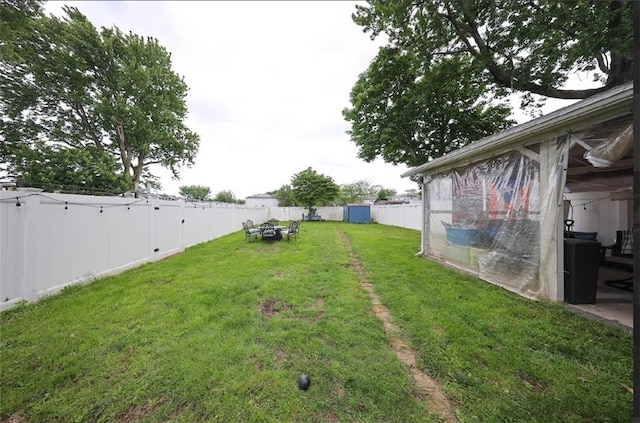 28 Trinity Pl, Staten Island, NY 10310 - fenced backyard with a storage unit