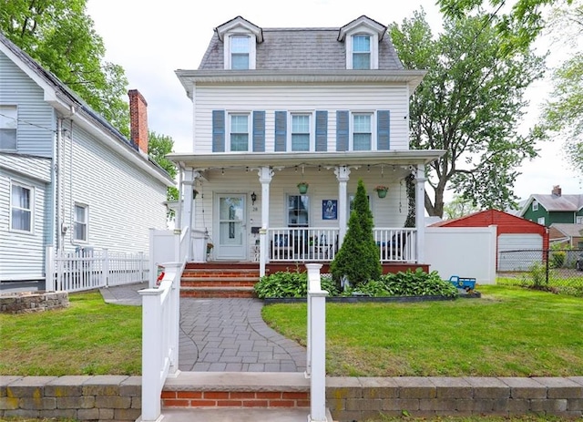 28 Trinity Pl, Staten Island, NY 10310 - second empire-style home with a porch and mansard roof