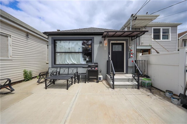 4 Lake Ave, Brooklyn, NY 11235 - entrance to property featuring a patio and a shingled roof