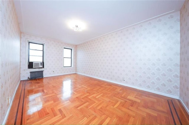 1543 W 1st St Unit D1, Brooklyn, NY 11204 - unfurnished room with radiator, baseboards, wallpapered walls, cooling unit, and ornamental molding