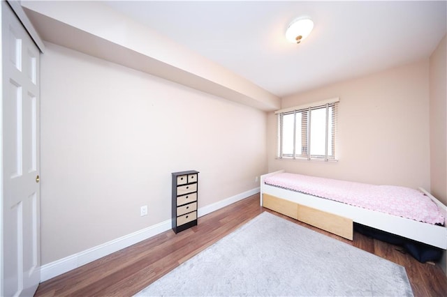 177 Russek Dr Unit 1, Staten Island, NY 10312 - bedroom featuring wood finished floors and baseboards