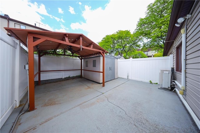 177 Russek Dr Unit 1, Staten Island, NY 10312 - fenced backyard featuring a cooling unit, a patio, and a carport